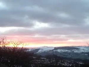 A wintry sunset off grid sustainable eco glampsite and glamping