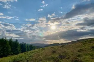 On the hills looking west to snowdonia off grid sustainable eco glampsite and glamping