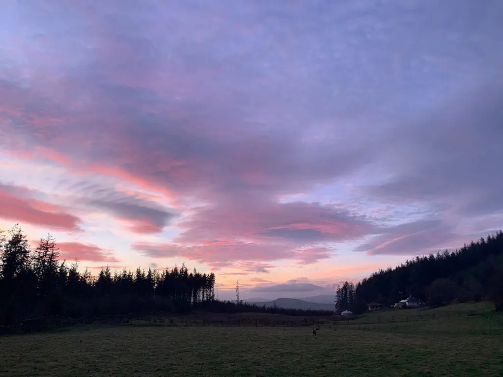 Pink purple blue sky at night.... off grid sustainable eco glampsite and glamping
