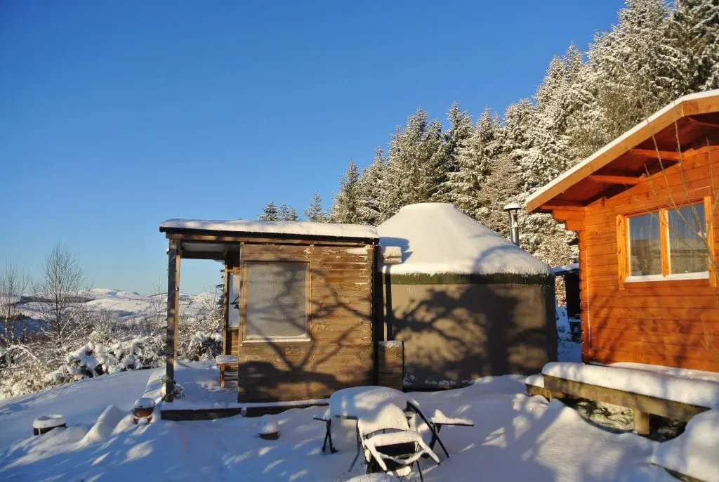Ty crwn bach idris yurt and log cabin in the snow off grid sustainable eco glampsite and glamping