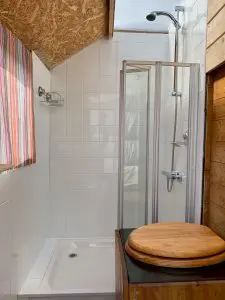 Ty crwn mawr yurt bathroom compost loo and hot shower off grid sustainable eco glampsite and glamping