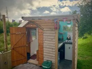Ty crwn mawr yurt kitchen and bathroom off grid sustainable eco glampsite and glamping