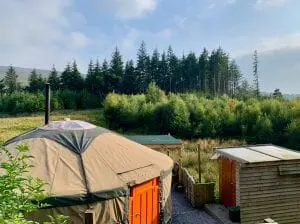 Ty crwn mawr yurt outside new cover 3 off grid sustainable eco glampsite and glamping