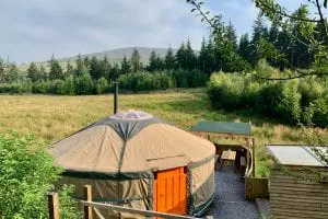 Ty crwn mawr yurt outside new cover 4 off grid sustainable eco glampsite and glamping