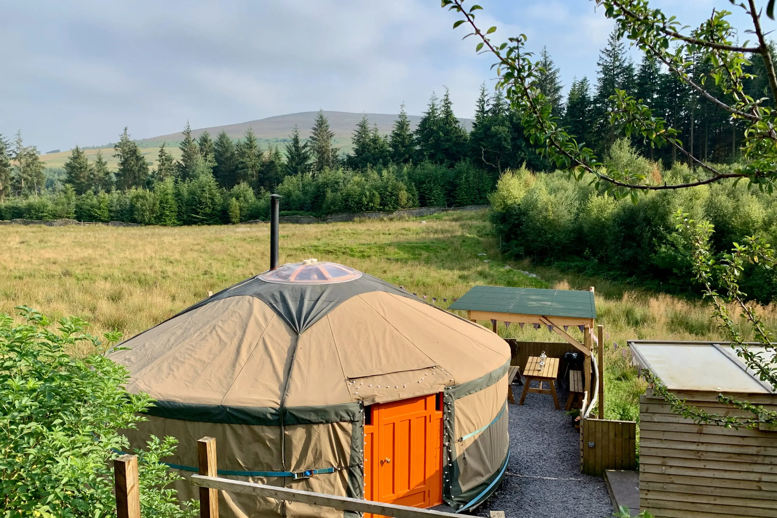 Ty crwn mawr yurt outside new cover 4 off grid sustainable eco glampsite and glamping