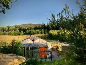 Ty crwn mawr yurt outside off grid sustainable eco glampsite and glamping
