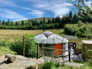 Ty crwn mawr yurt outside old cover 4 off grid sustainable eco glampsite and glamping