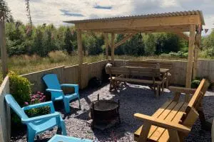 Ty crwn mawr yurt outside covered dining area and fire pit 9 off grid sustainable eco glampsite and glamping
