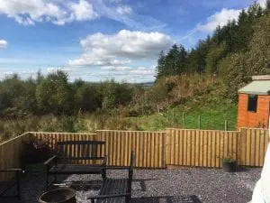 Ty crwn mawr yurt seating area and firepit off grid sustainable eco glampsite and glamping