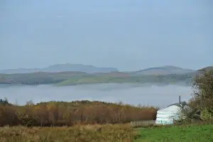 Ty crwn mawr yurt with the roundhouse and the dragon breath in the dee valley off grid sustainable eco glampsite and glamping