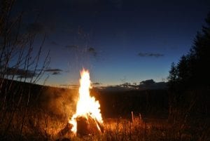 Grandfather fire under the night sky at ty mam mawr eco retreat centre
