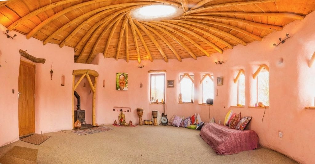 Inside Ty Mam Mawr straw bale roundhouse - the roof is a vortex to the higher realms...