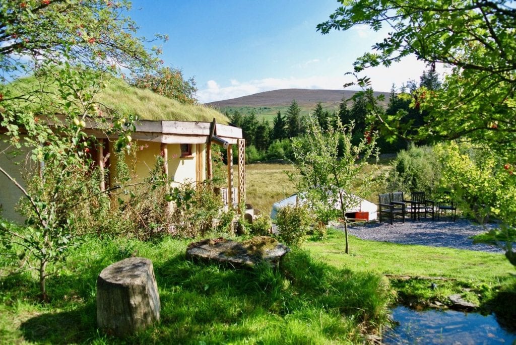 Moel y Henfaes and Ty Mam Mawr straw bale roundhouse with the yurt in the background