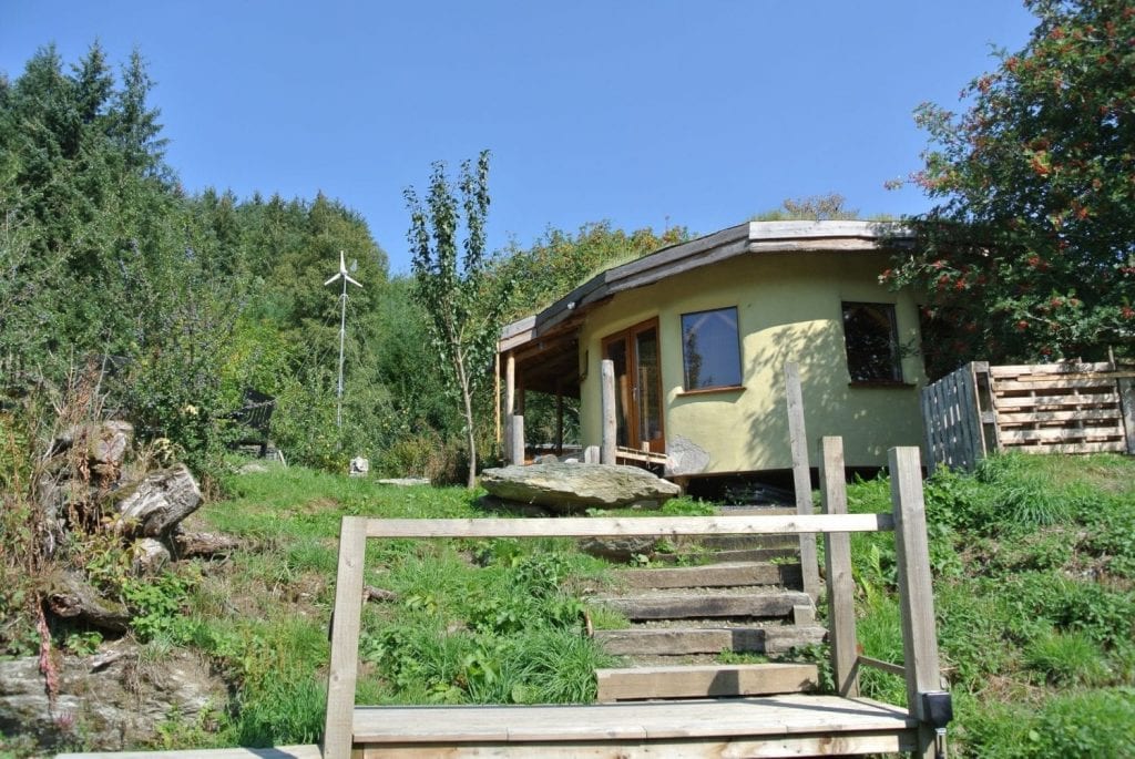 The eco retreat centre straw bale roundhouse from the south just by the big yurt