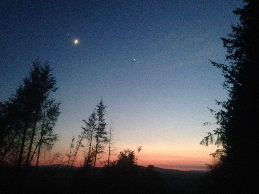 Sunset and the moon off grid sustainable eco glampsite and glamping