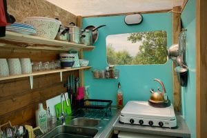 Ty crwn mawr yurt kitchen off grid sustainable eco glampsite and glamping