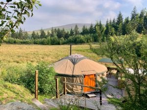 Ty crwn mawr yurt outside new cover 1 off grid sustainable eco glampsite and glamping